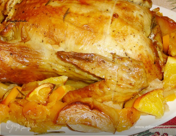 Курица запеченная с яблоками и апельсинами