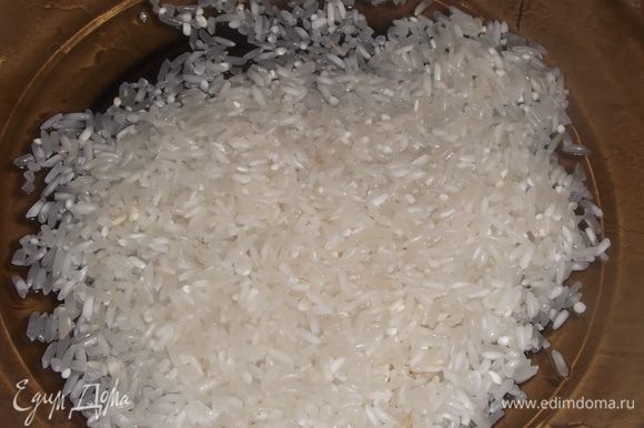 Промыть рис.