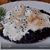 Рыбные клецки с черным рисом и сливочно-икорным соусом